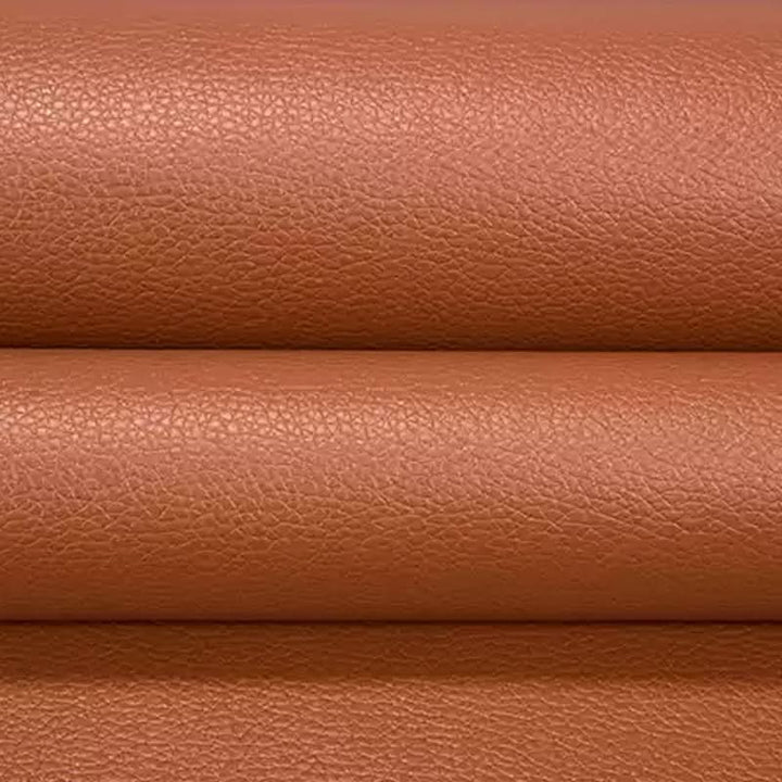Upholstery repair patch with strong self-adhesive for leather & fabric car seats & sofas.