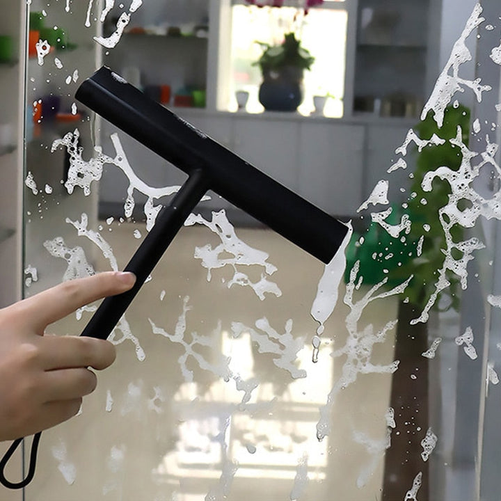 Ergonomic shower squeegee ensures streak-free glass, mirrors, and tile in any modern bathroom.