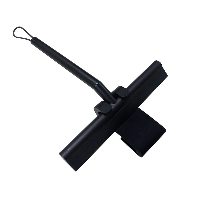 Efficient cleaning tool: shower squeegee for streak-free glass, shower walls, and bathroom tiles.