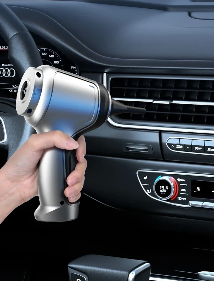 "Silver cordless car vacuum cleaner with 95000Pa suction, sleek and lightweight for efficient car and home cleaning."