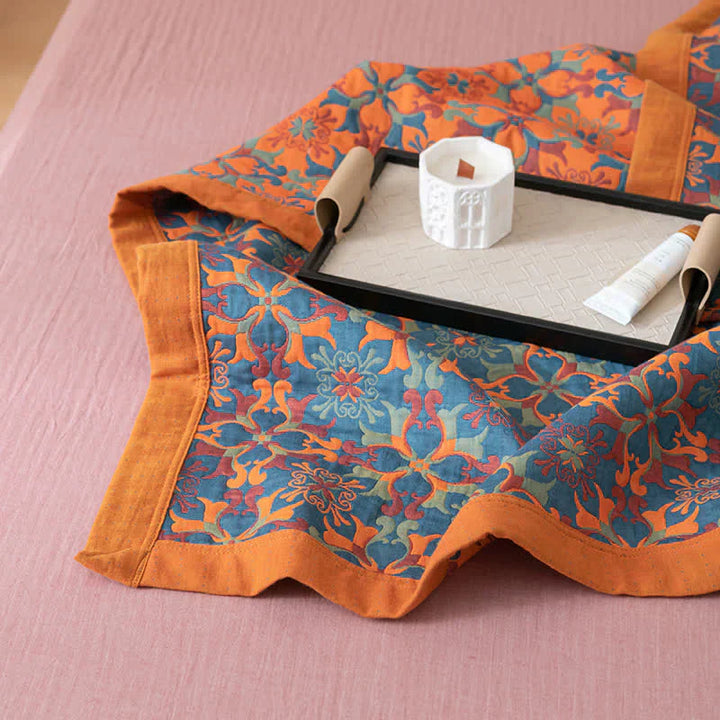Durable six-layer cotton quilt. Bold orange & blue pattern makes this a standout piece of patterned bedding.