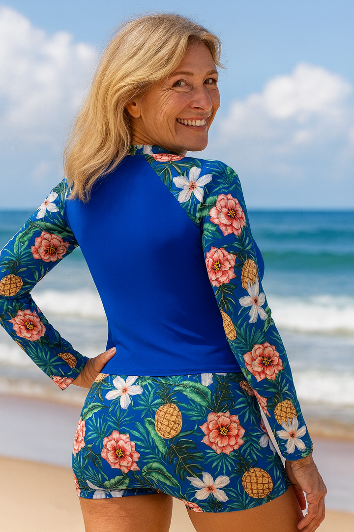 Women's sky blue sun protection long sleeve swim set with shorts, perfect for active swimwear & UV protection.