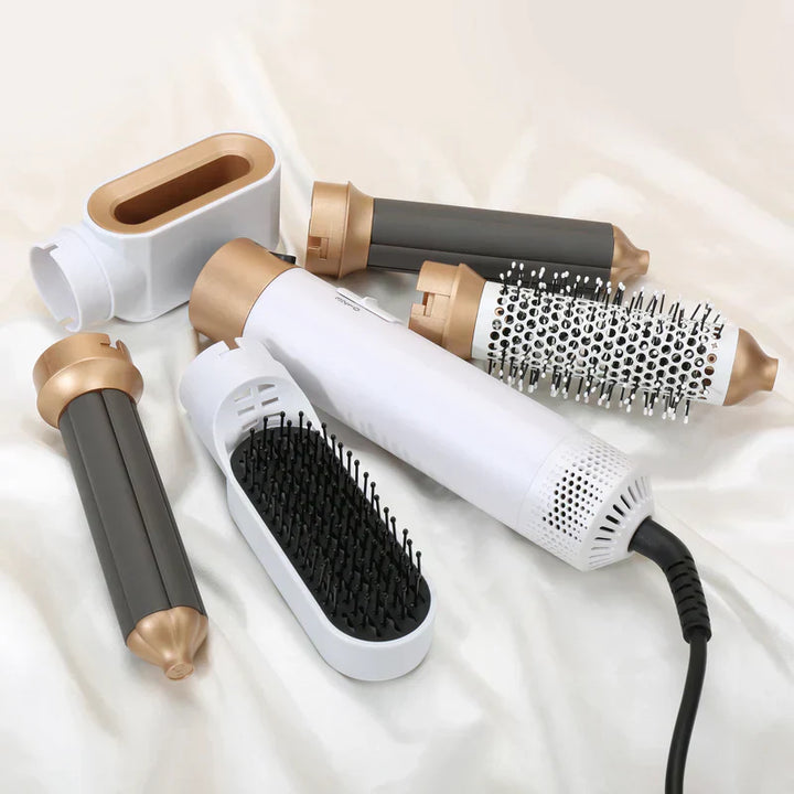 "Sleek 5-in-1 hair styler with attachments for curling, straightening, and drying; compact design, fits all hair types."