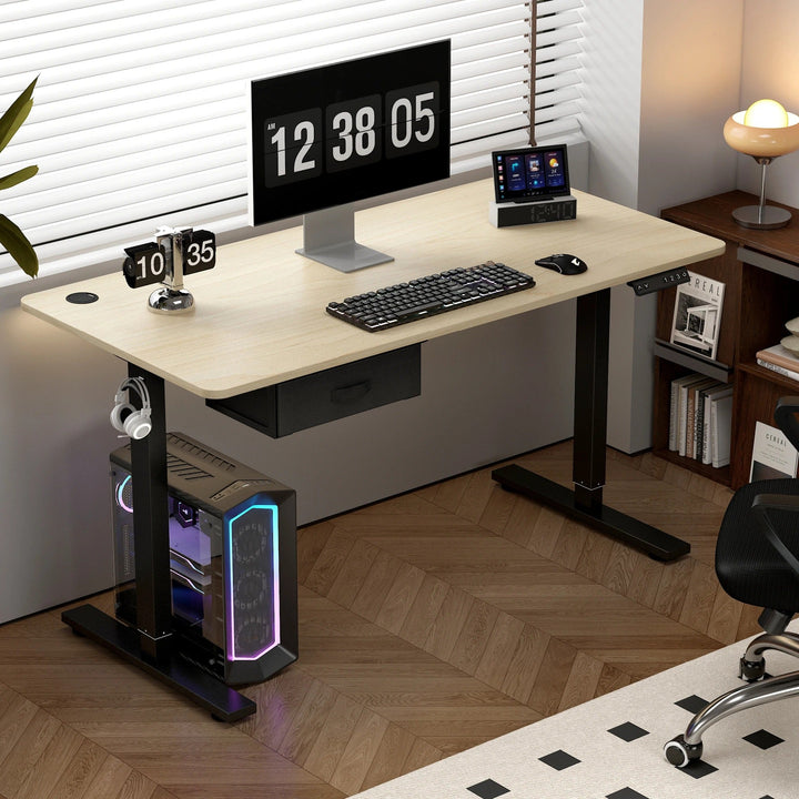 "Sleek adjustable electric standing desk with spacious drawer, USB ports; suits sitting/standing positions in home office."