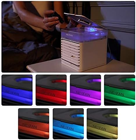 "Sleek compact portable air conditioner fan with white and grey finish, ideal for small spaces and efficient cooling."