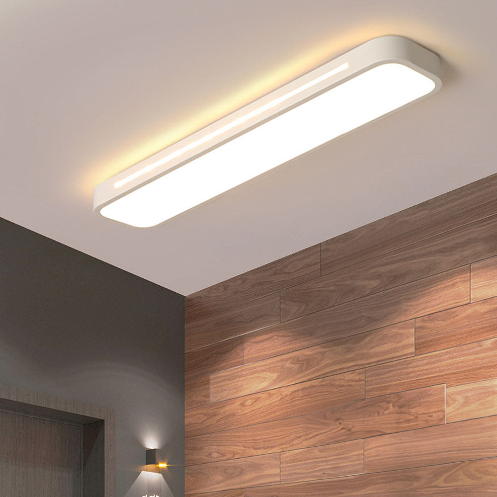 "Sleek minimalist linear LED ceiling light with iron and acrylic design, perfect for modern homes, available in three sizes."