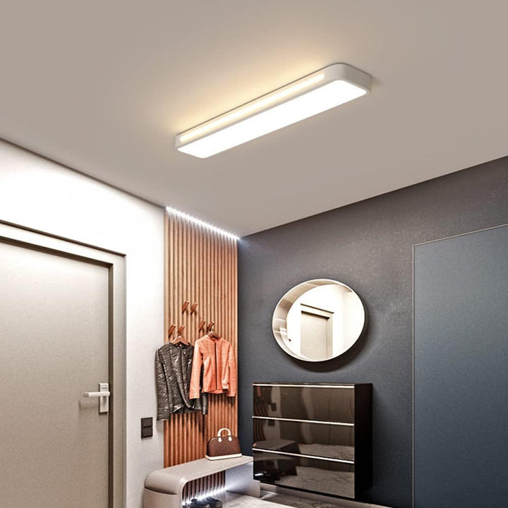 "Sleek minimalist linear LED ceiling light with iron and acrylic design, perfect for modern homes, available in three sizes."