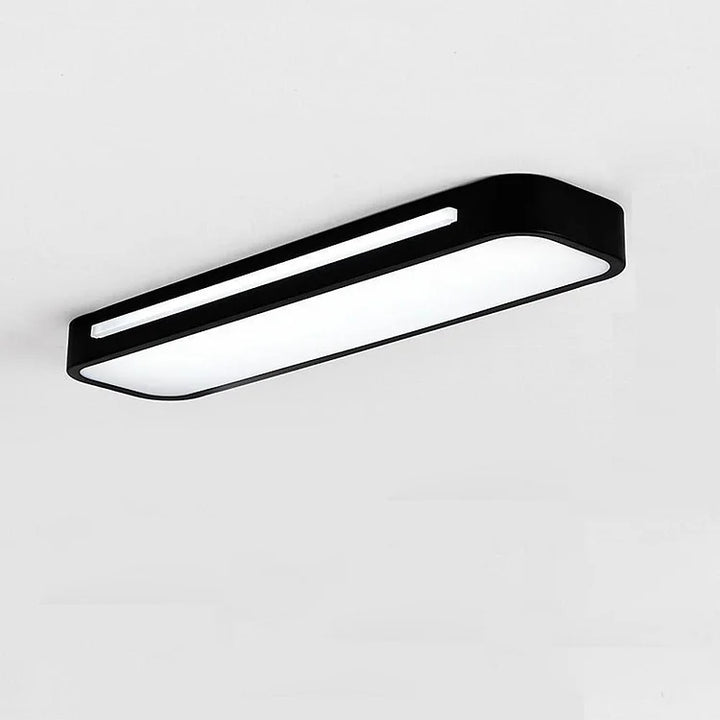 "Sleek minimalist linear LED ceiling light with iron and acrylic design, perfect for modern homes, available in three sizes."