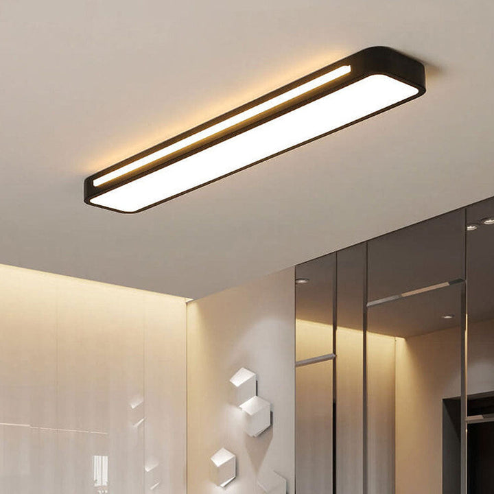 "Sleek minimalist linear LED ceiling light with iron and acrylic design, perfect for modern homes, available in three sizes."