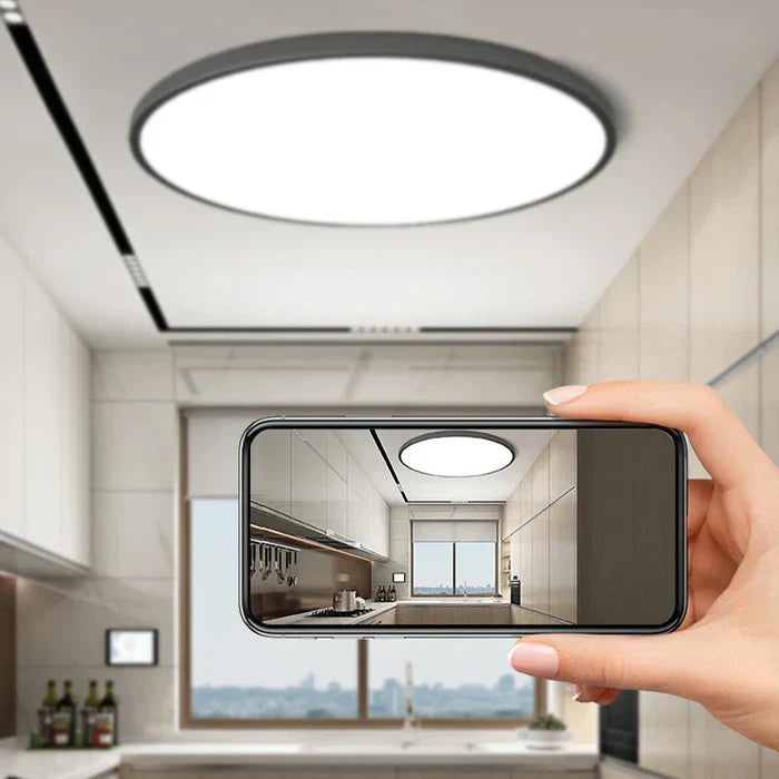 Modern LED ceiling light, ideal for living room, dining room, or bedroom lighting.