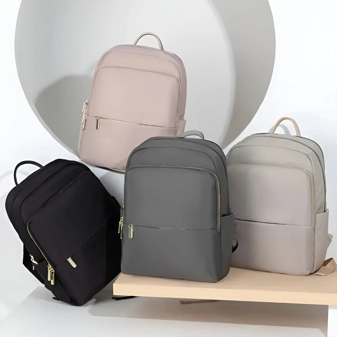 Everyday commuter backpack for women, sleek & waterproof with dedicated laptop sleeve.