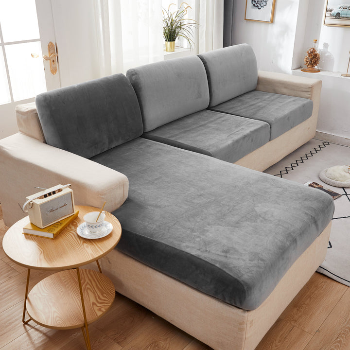 "Smoke velvet sectional sofa cover, snug fit, enhances decor, protects against stains and wear, ideal for pet-friendly homes.