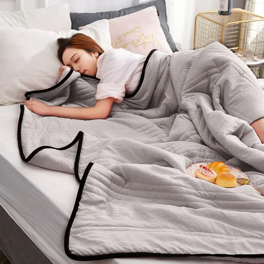 Soft, breathable bamboo fiber & cotton blend cooling blanket for summer comfort. Lightweight bedding for ultimate relaxation.