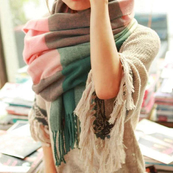 Luxurious women's cashmere wrap, cozy winter fashion accessory.