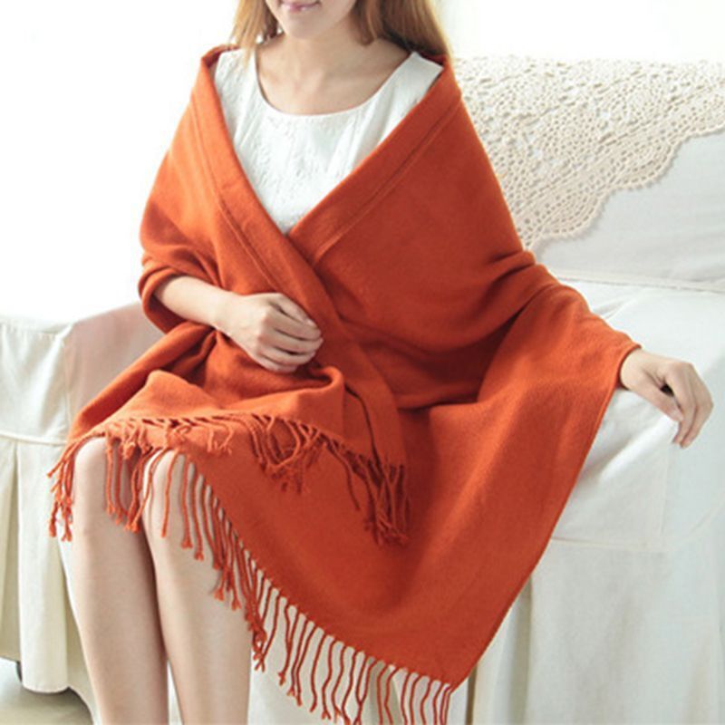 Cozy cashmere scarf, must-have stylish winter accessory for women.