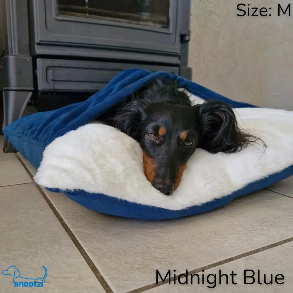 Comfortable pet bed, the CuddleNest Lounger, designed for anxiety relief. A soft, washable dog lounger & cuddler bed.
