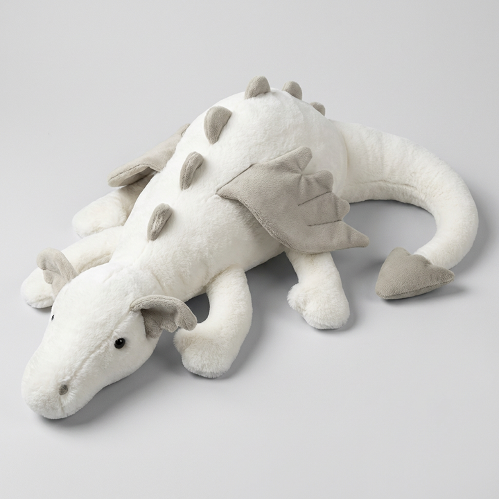 Adorable dragon plushie, a soft and cuddly stuffed animal for kids, perfect as a fantasy toy or room decor gift.