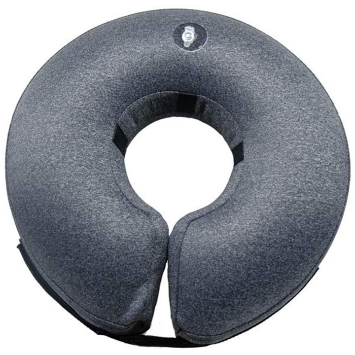 Dog's soft recovery collar, an inflatable cone alternative providing comfort & protection post-surgery.
