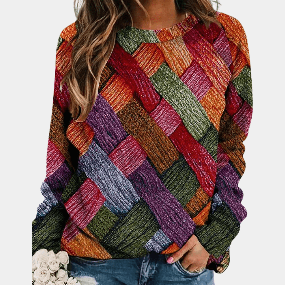 Soft knitted women's sweater for eco-friendly comfort. Cozy long-sleeve top for casual, warm wear.