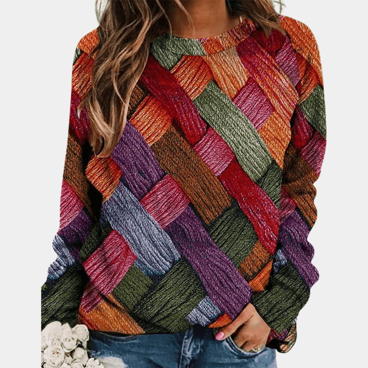 Soft knitted women's sweater for eco-friendly comfort. Cozy long-sleeve top for casual, warm wear.