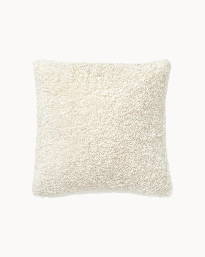 Luxurious plush teddy cushion cover, super soft and fluffy for ultimate living room comfort.