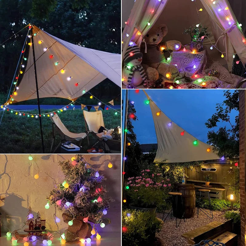 Charming solar festoon string lights draped across a garden, ideal for patio & outdoor decor.
