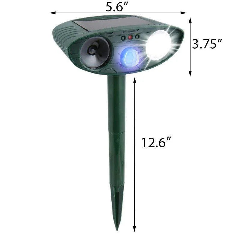 Solar-powered ultrasonic deer repeller with green casing, motion sensor, solar panel, ideal for outdoor garden protection.