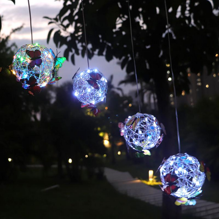 Decorative solar-powered LED butterfly garden light, perfect for outdoor patio ambiance and eco-friendly illumination.