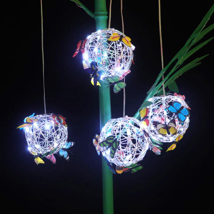 Beautiful LED butterfly solar light enhancing garden & patio. Eco-friendly outdoor lighting with decorative charm.