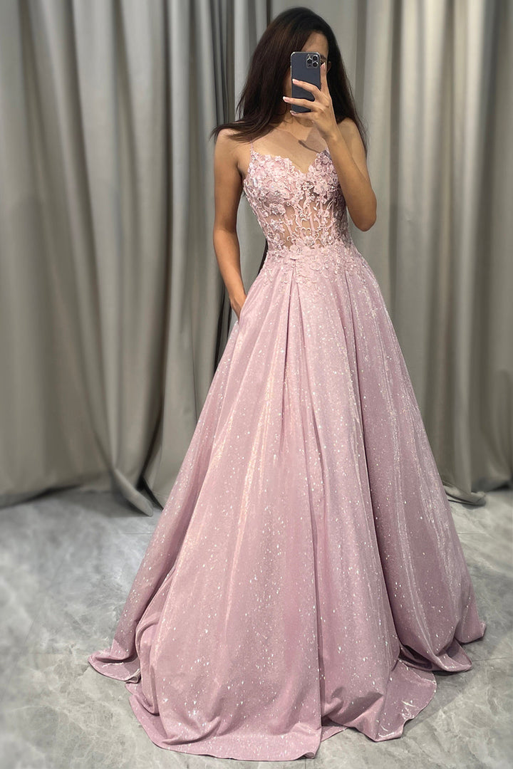 Sparkling blush A-line ball gown for women. Perfect for prom, wedding guests, or formal events. Glamorous V-neck.