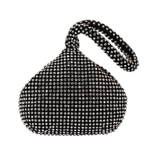 Silver rhinestone clutch bag for women, an elegant evening handbag with dazzling sparkle.