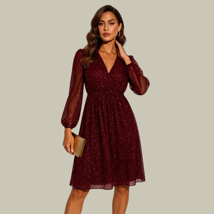 Chic women's V-neck mini sequin dress with stylish puff long sleeves, a glamorous choice for cocktail parties.