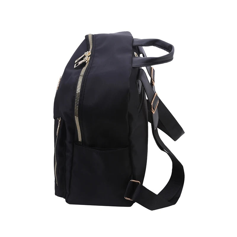Elegant women's black PU leather travel backpack, combining sophistication with everyday practicality.