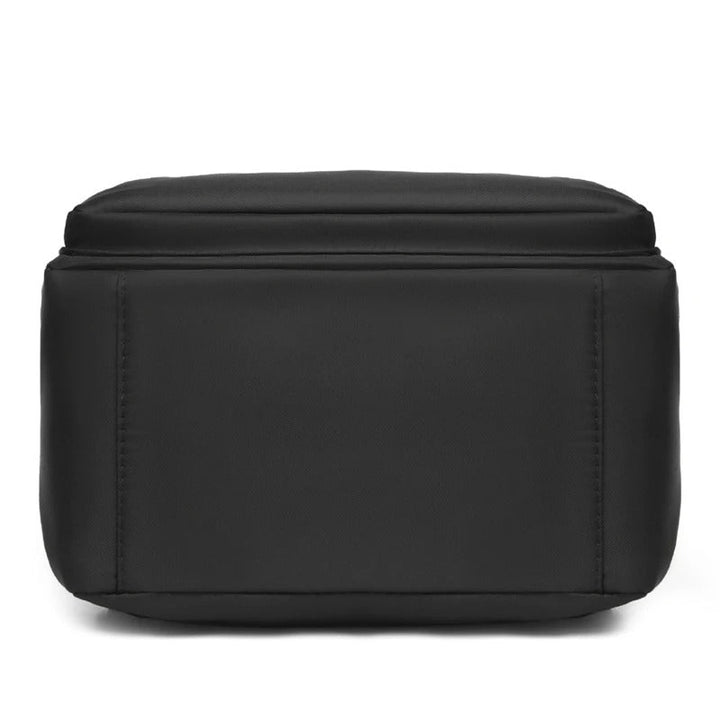 Modern women's fashion backpack in black PU leather, a sleek and essential accessory for contemporary style.