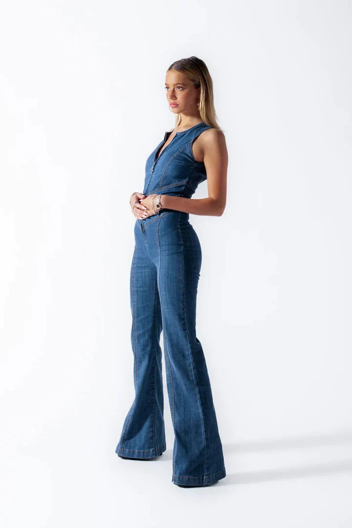 Stylish blue women's fashion jumpsuit featuring a unique heart-shaped back cutout, ideal for casual chic or elegant wear.