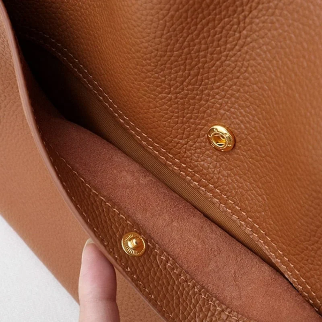 Durable leather shoulder bag for women. High-quality construction & stylish design for long-lasting use.
