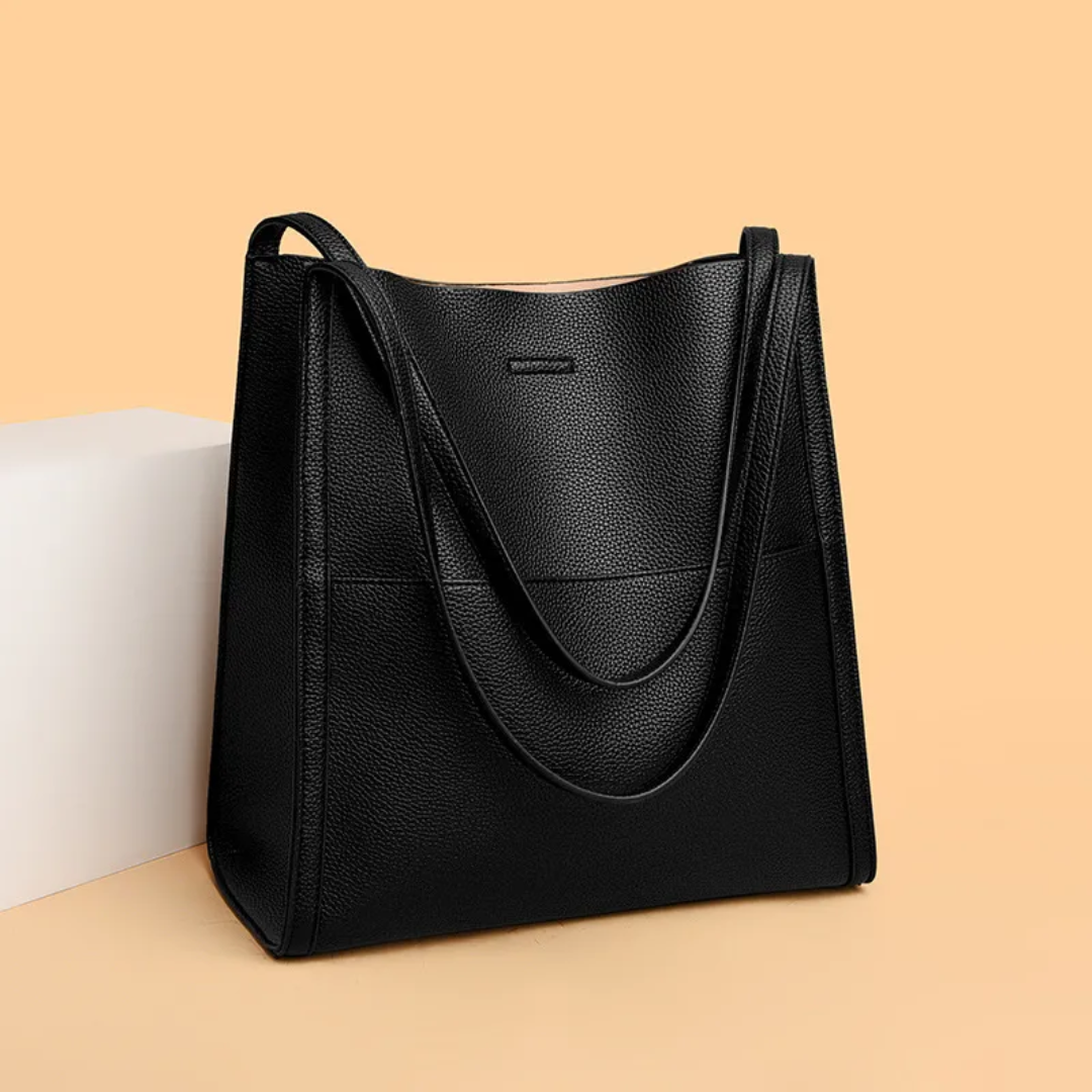 Fashionable women's large leather handbag. A stylish accessory, this durable tote complements any outfit.