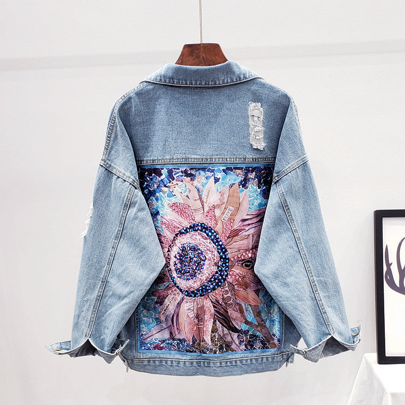 Stylish Lynn oversized women's denim jacket with unique back print, perfect for casual fall & spring fashion.