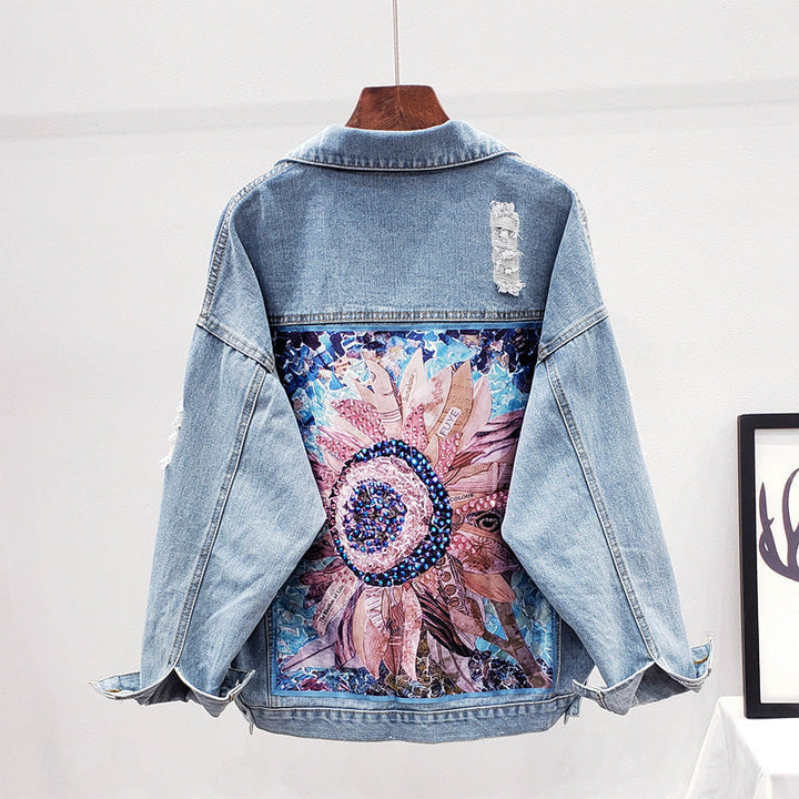 Stylish Lynn oversized women's denim jacket with unique back print, perfect for casual fall & spring fashion.