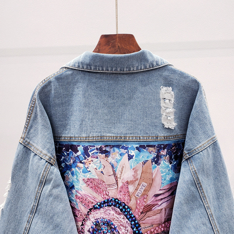 Trendy oversized women's fashion jacket, Lynn denim style, with statement back print for versatile street style.