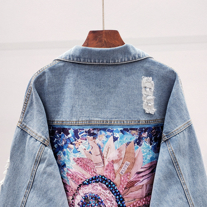 Trendy oversized women's fashion jacket, Lynn denim style, with statement back print for versatile street style.