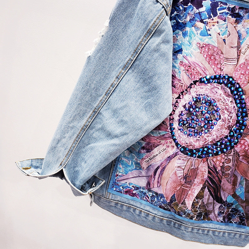 Lynn women's oversized denim jacket with eye-catching back print, a stylish outerwear statement for fall and spring.