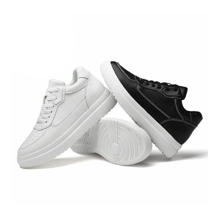 Discreet height-increasing men's shoes. These stylish sneakers provide a confidence boost with subtle lift.