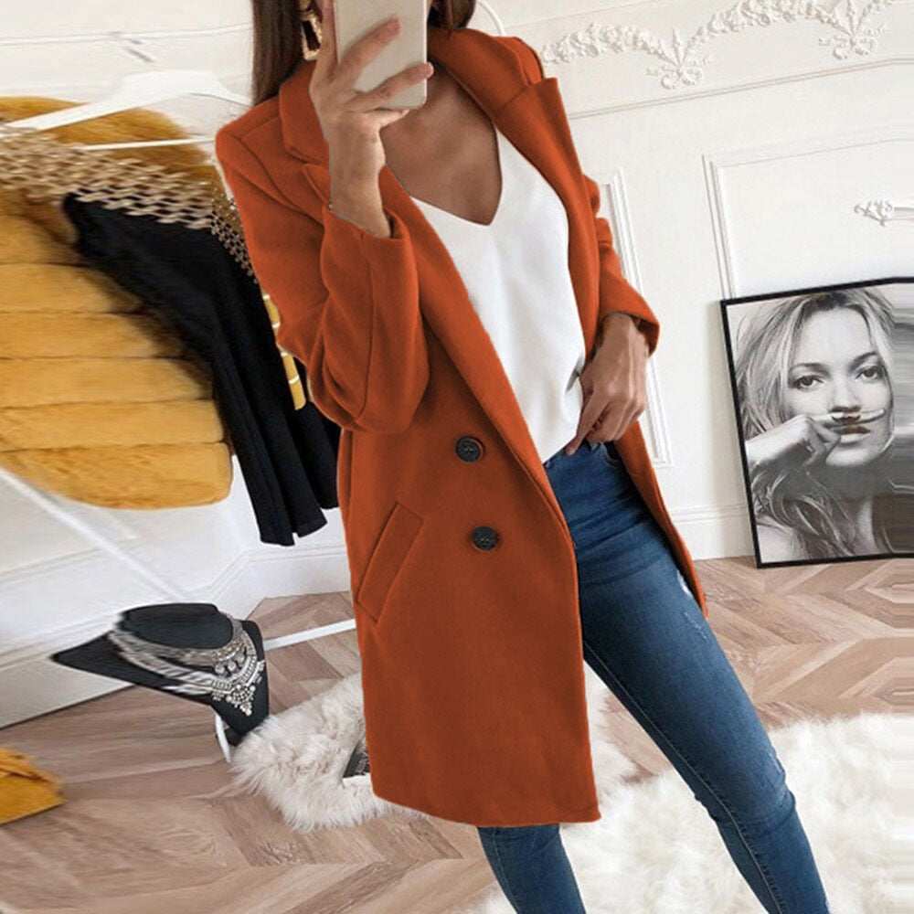 Chic button-up women's coat with functional pockets. Elegant long-sleeve ladies outerwear, perfect for fall style.