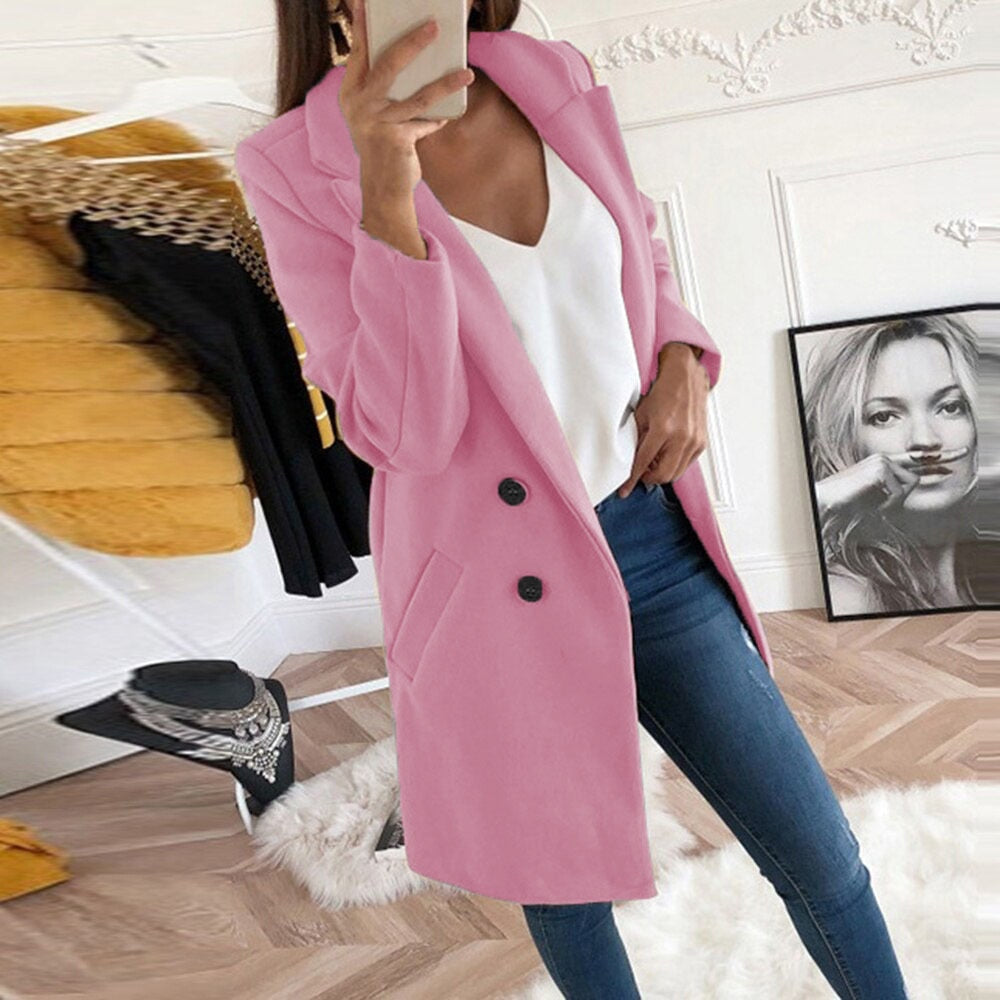 Stylish Mila women's coat featuring a chic button-up front and practical pockets. Elegant long-sleeve outerwear.