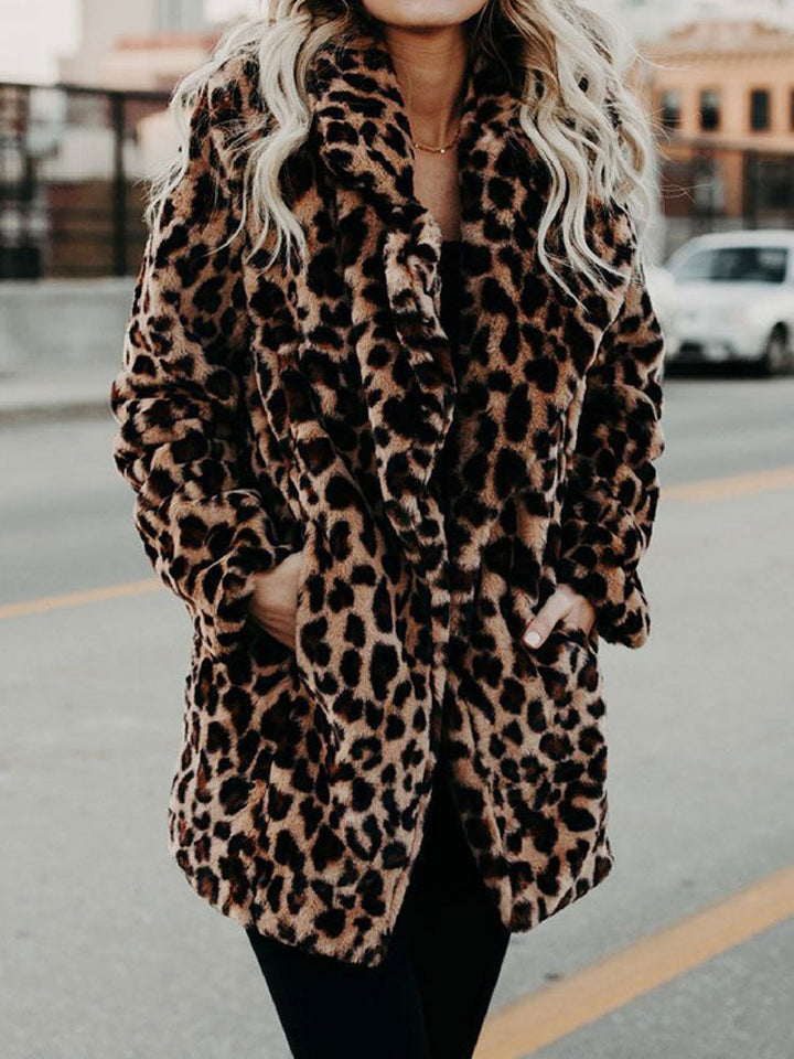 Women's Sofia leopard print winter coat with oversized collar. Trendy outerwear for stylish cold-weather fashion.