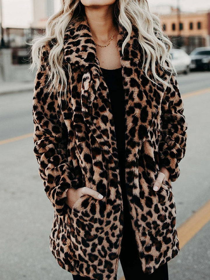 Bold Sofia women's leopard print winter coat. Trendy statement outerwear, perfect for stylish cold-weather fashion.