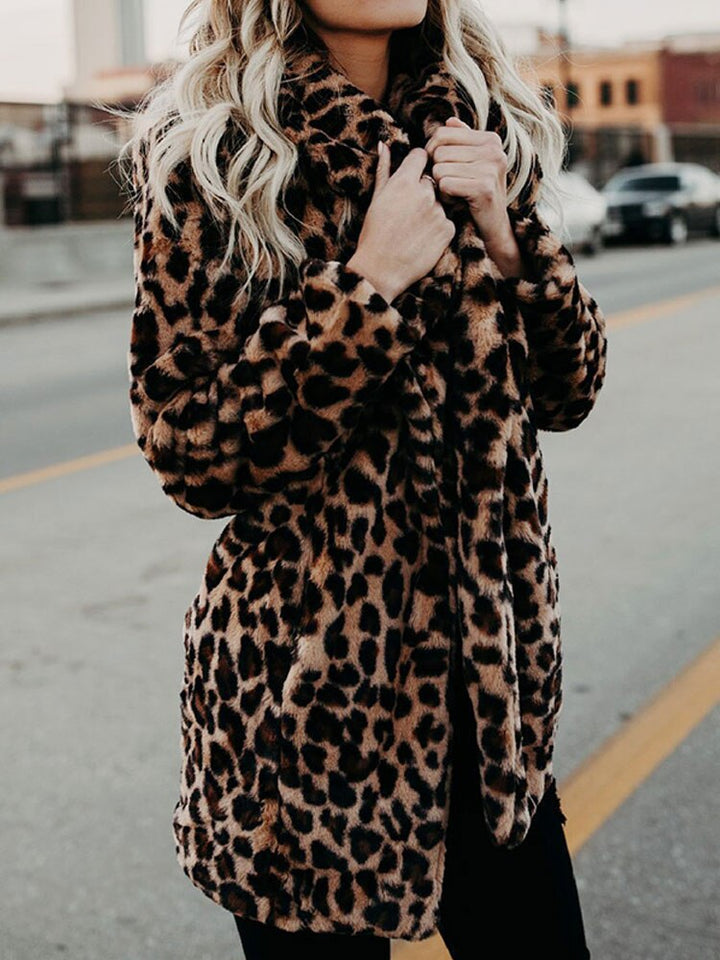 Warm Sofia women's leopard print winter jacket. Stylish outerwear for a trendy, bold fashion winter statement.
