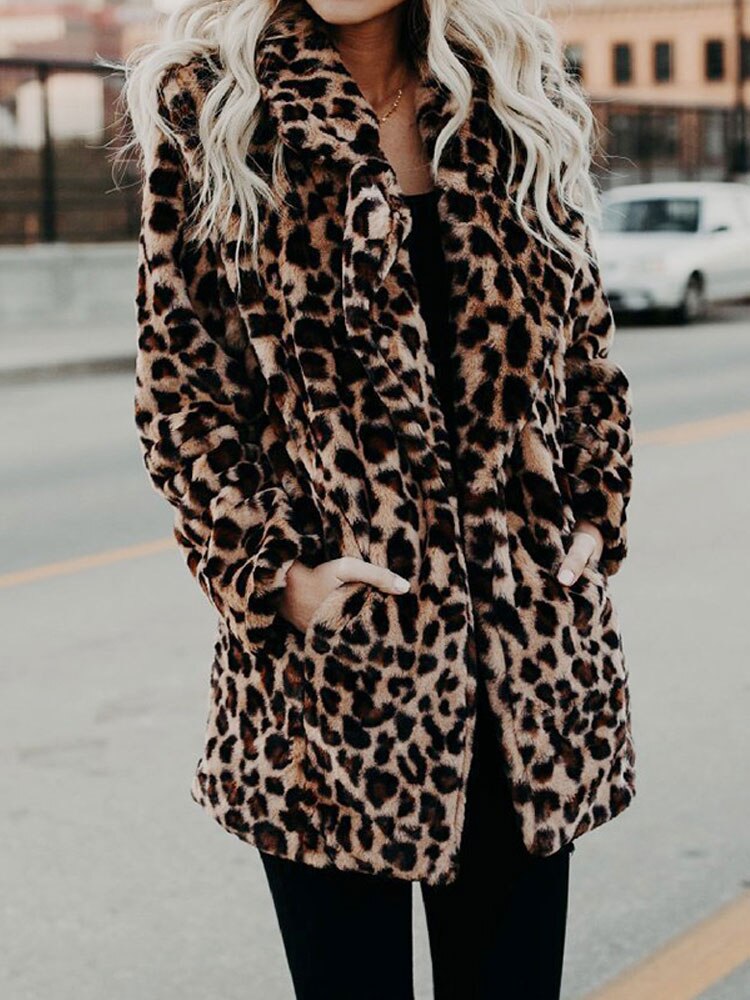 Elegant Sofia women's leopard print winter coat, detailing the luxurious print & warm fabric. Bold fashion.