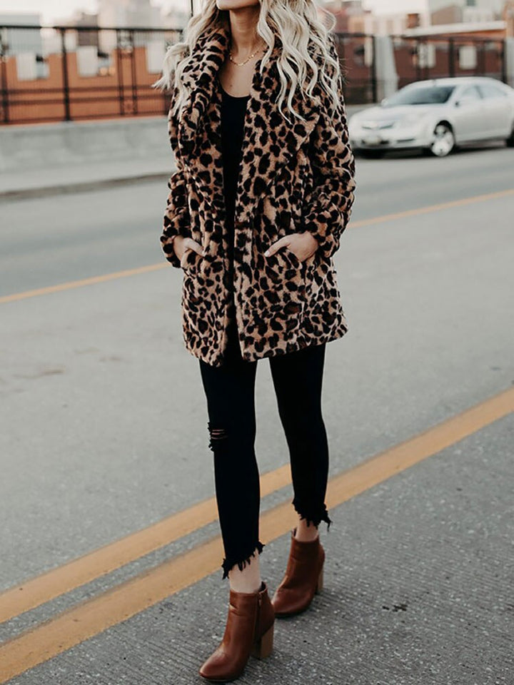 Trendy Sofia women's leopard print winter coat. Stylish, warm outerwear for a fierce and fashionable winter look.